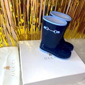 Girls Gucci boots.